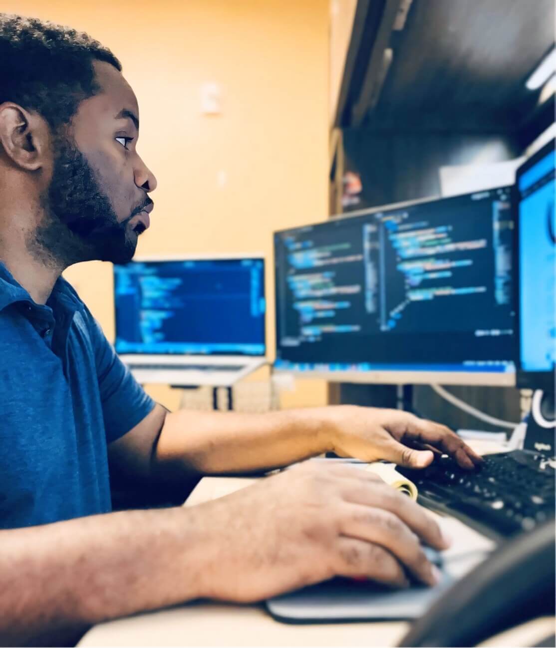 Kerwin Thompson developing software at his workstation